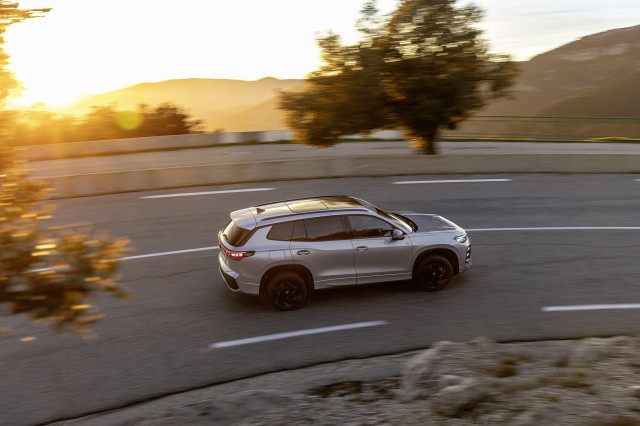 car driving at sunset 