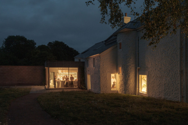 osip at night with illuminated kitchen
