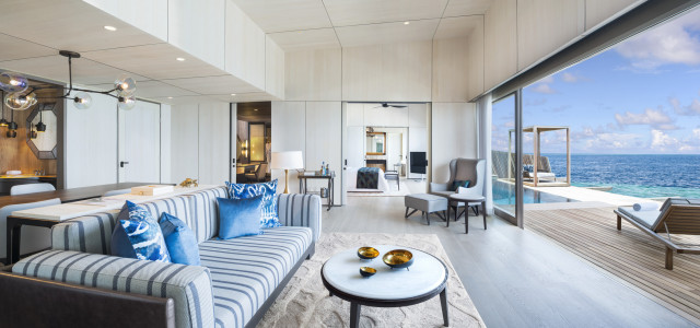 living room inside overwater villa at st regis maldives 