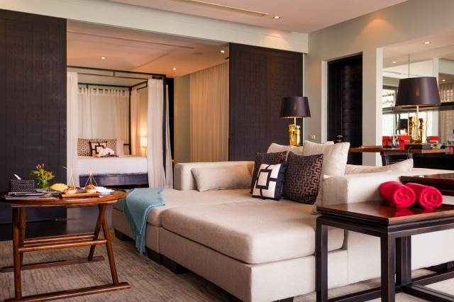 hotel suite sofa area with side tables and lamps