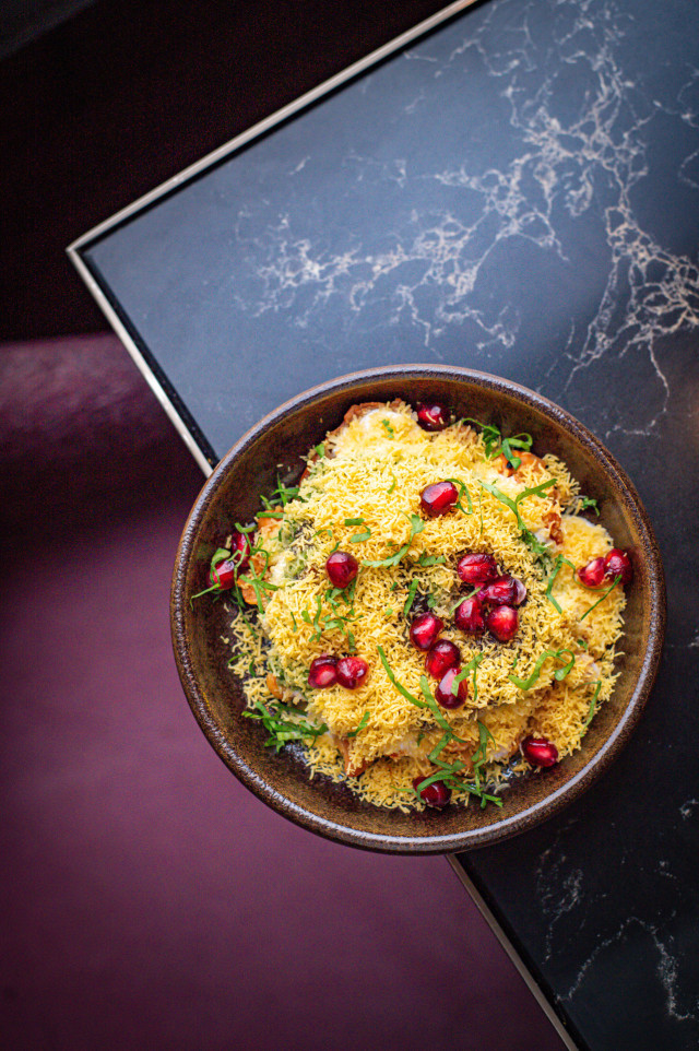 dish topped with pomegranate seeds