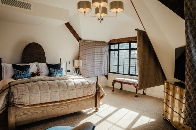 wooden bed inside hotel room 