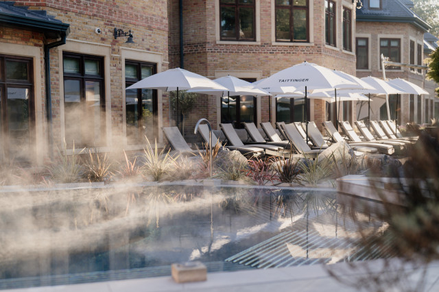 hot outdoor pool with steam rising off it 