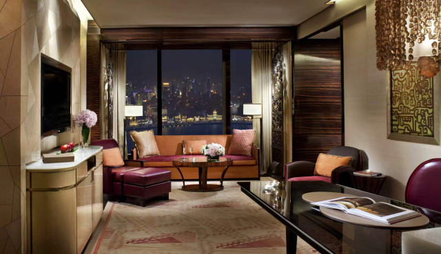 hotel suite living room with sofas and chairs