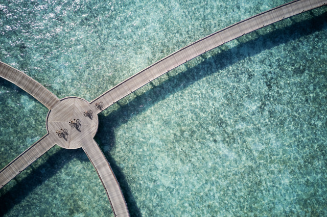 aerial view of bridge across maldives sea