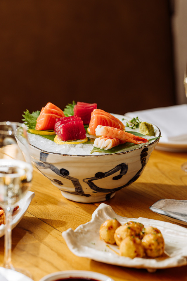 fresh sushi in a bowl filled with ice 