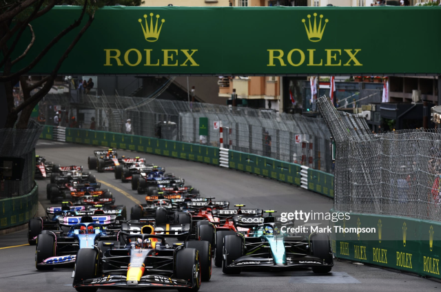 Max Verstappen of the Netherlands driving the (1) Oracle Red Bull Racing RB19 leads Fernando Alonso of Spain driving the (14) Aston Martin AMR23 Mercedes and the rest of the field at the start during the F1 Grand Prix of Monaco at Circuit de Monaco on May 28, 2023 in Monte-Carlo, Monaco. (Photo by Mark Thompson/Getty Images)