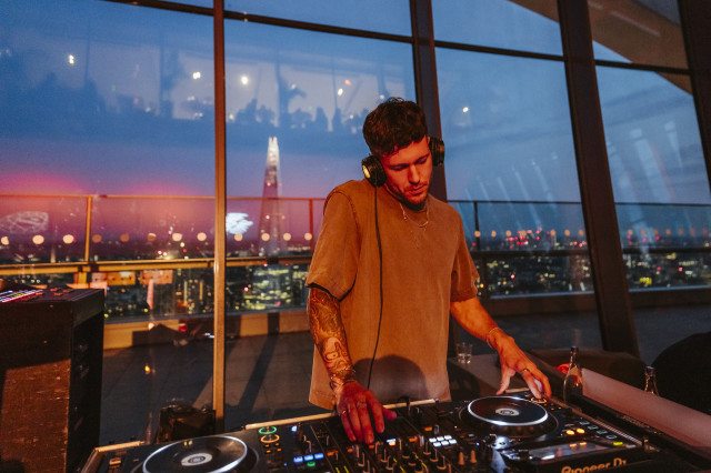 DJ playing in sky garden