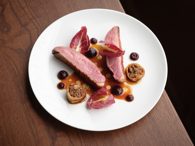 meat dish at starling restaurant on wooden table 