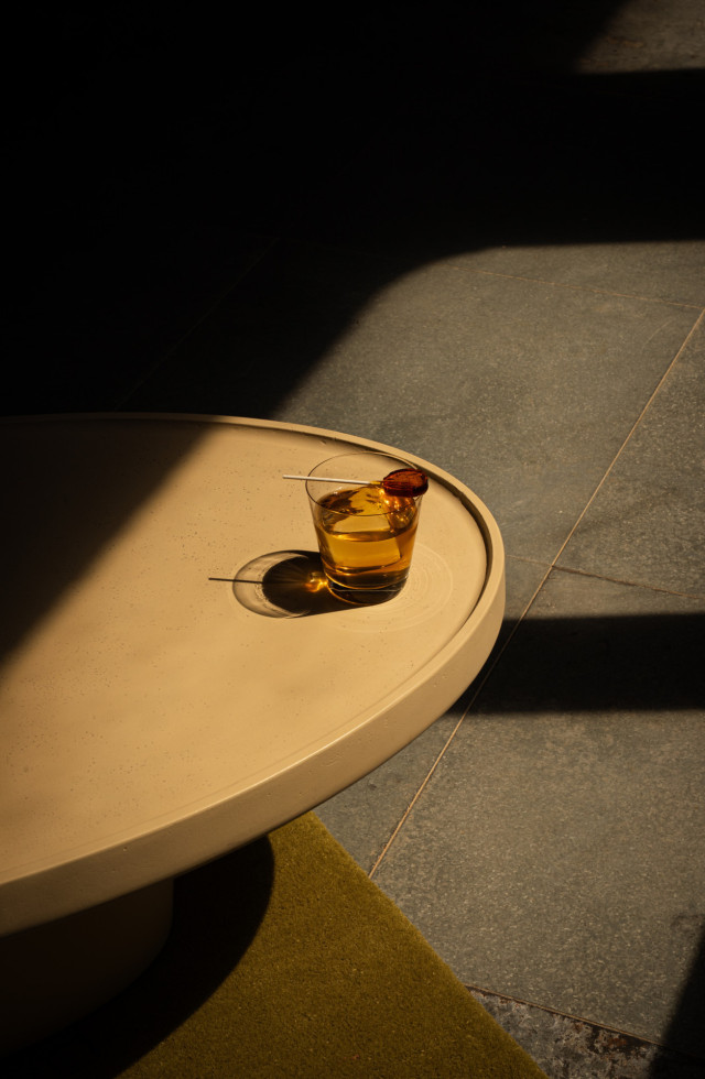 cocktail styled on round table in bar
