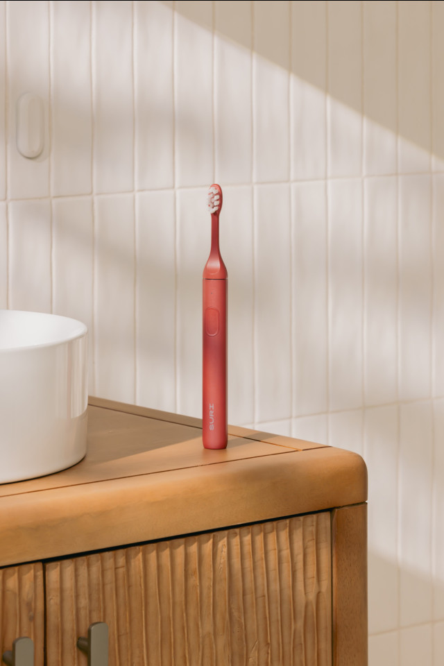 suri sonic toothbrush in canyon sunrise colourway 