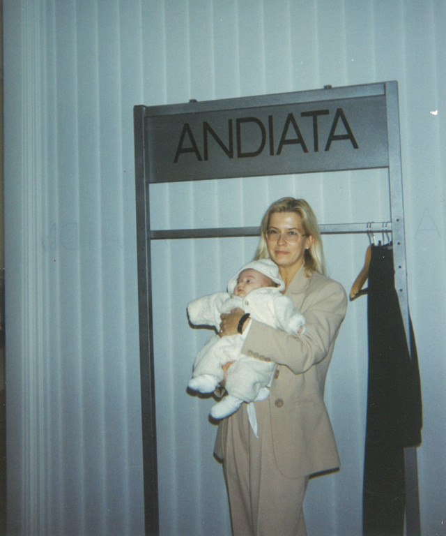 andiato founder holding baby daughter