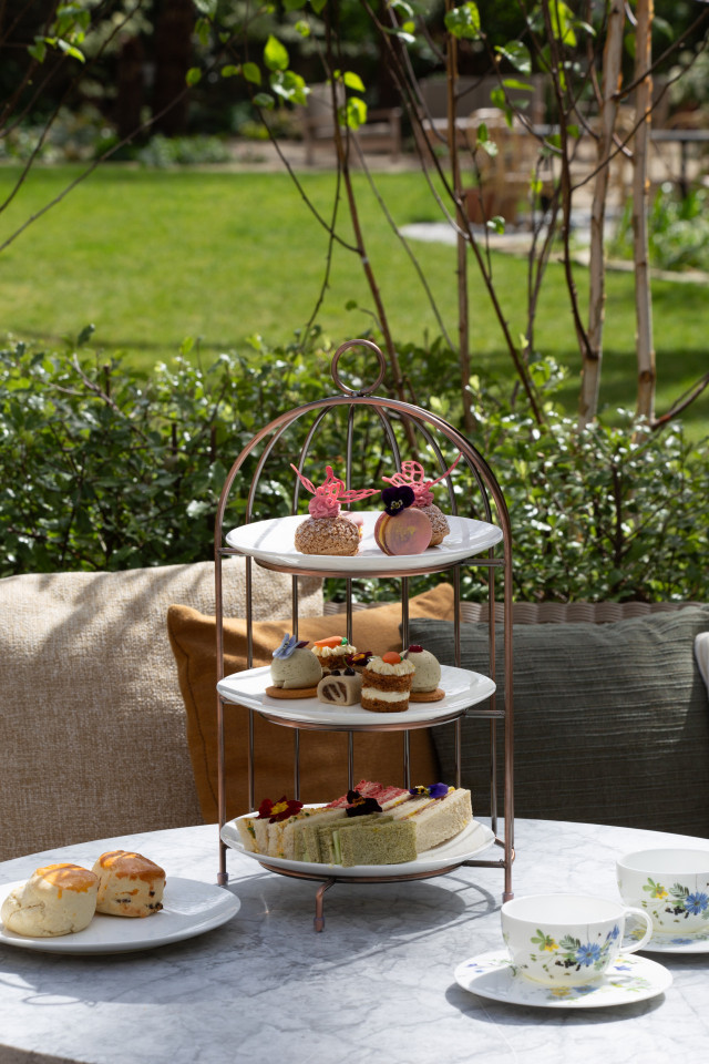 afternoon tea tier with cakes and macarons