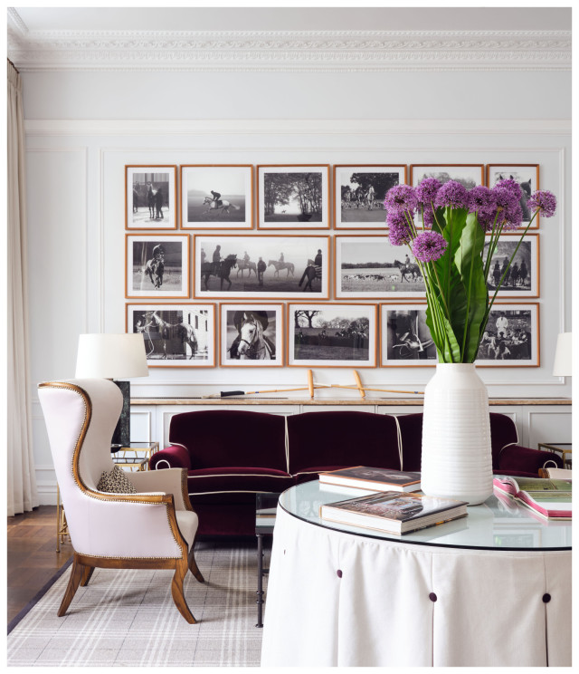 hotel louge area with pictures on wall 