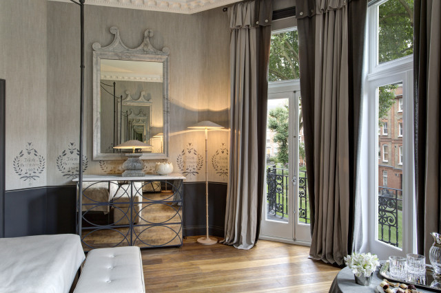 the franklin hotel garden suite room with mirror and neutral tones