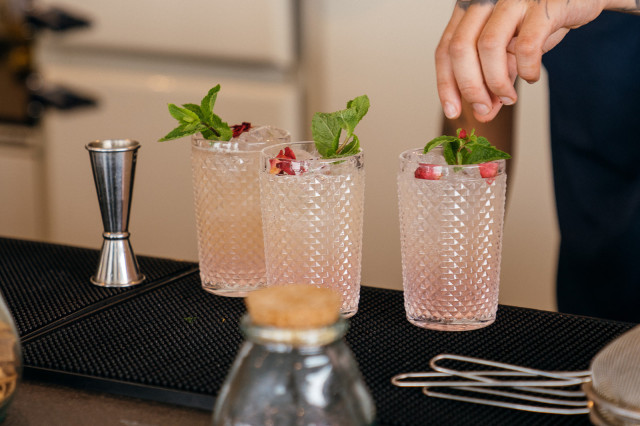three cocktails being prepared at restaurant