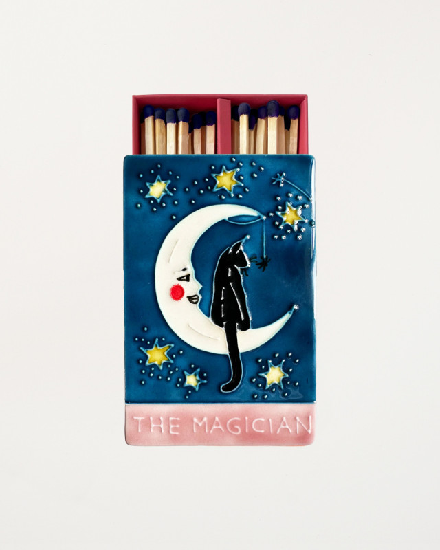 ceramic matchbox with moon on the front 