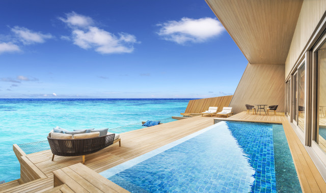 overwater villa with pool and decking at st regis maldives