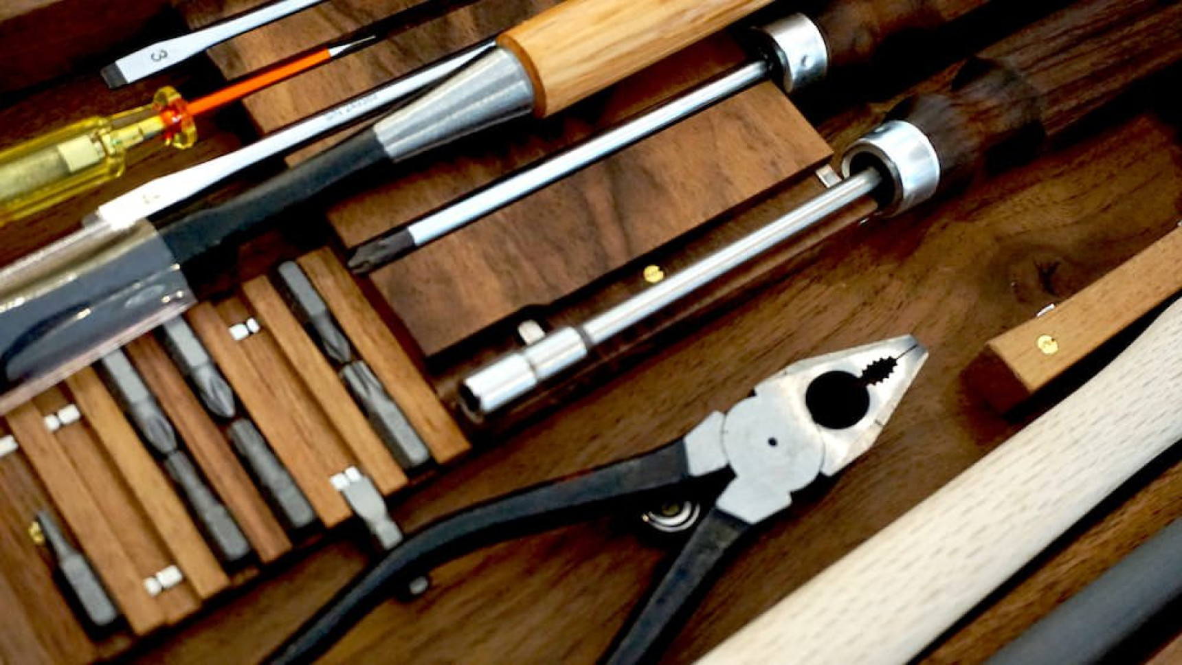 Picture of screwdrivers and plyers in a tool kit