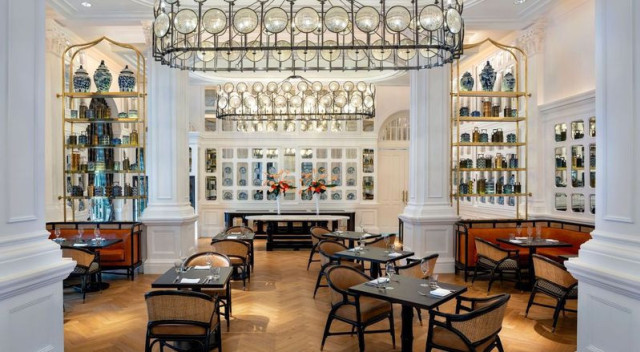 dining room inside hotel with tables and chairs