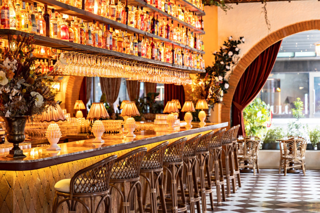 restaurant bar area with wicker chairs