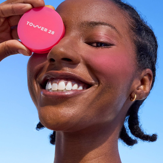 model holding tower 28 blusher