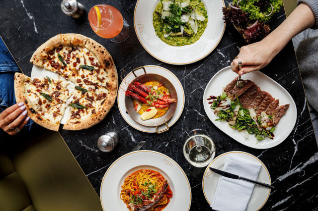 aerial food of pizza, prawns and pasta dishes at tozi 
