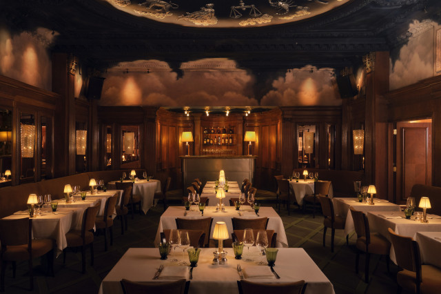 Dining room with zodiac detail inside Tramp