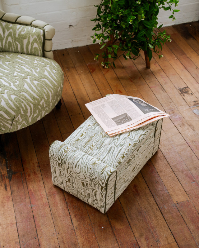 chair and stool on wooden floor