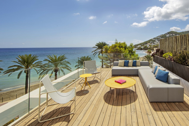balcony area in ibiza hotel room with sofa and two chairs