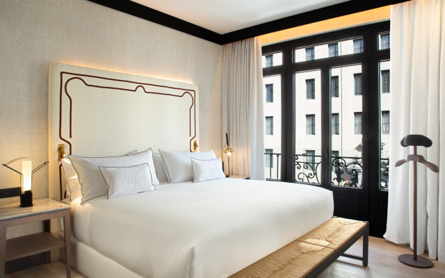 hotel suite with cream bed