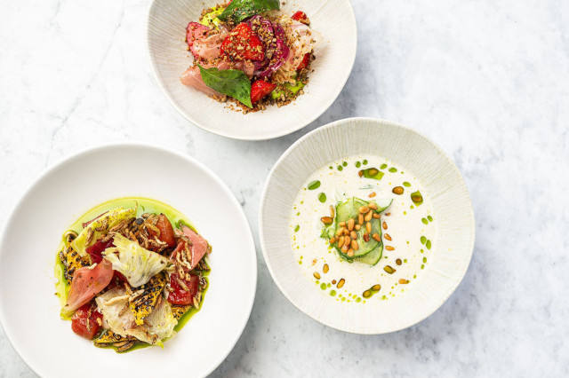 three dishes arranged on white marble table